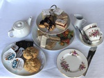 Afternoon tea with linen cloths and china crockery